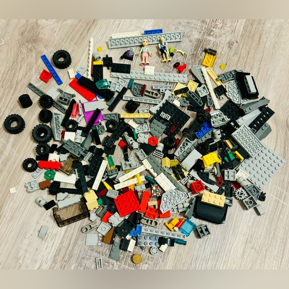 Lego Other - 0.697 lbs. Net weight of small Lego bricks. Various parts and pieces. There are